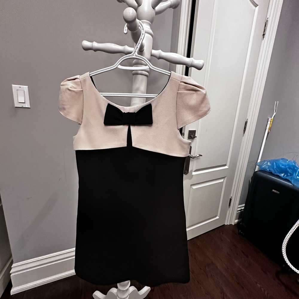 Elegant Black and Cream Dress with Bow